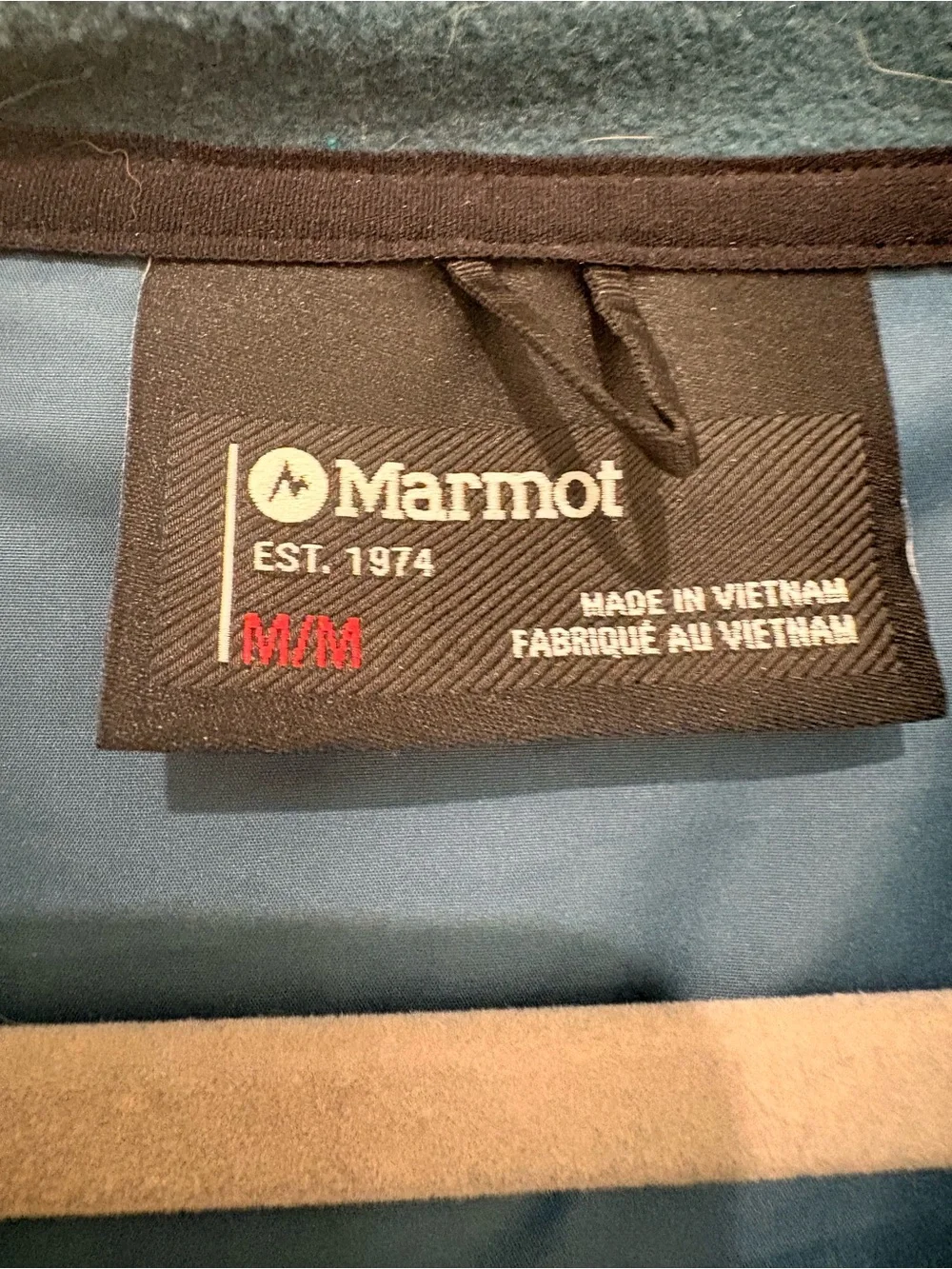 Marmot Hooded Hybrid Jacket in Teal and Turquoise
